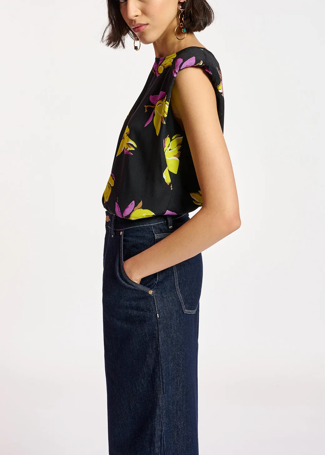 Black floral-print sleeveless top with padded shoulders